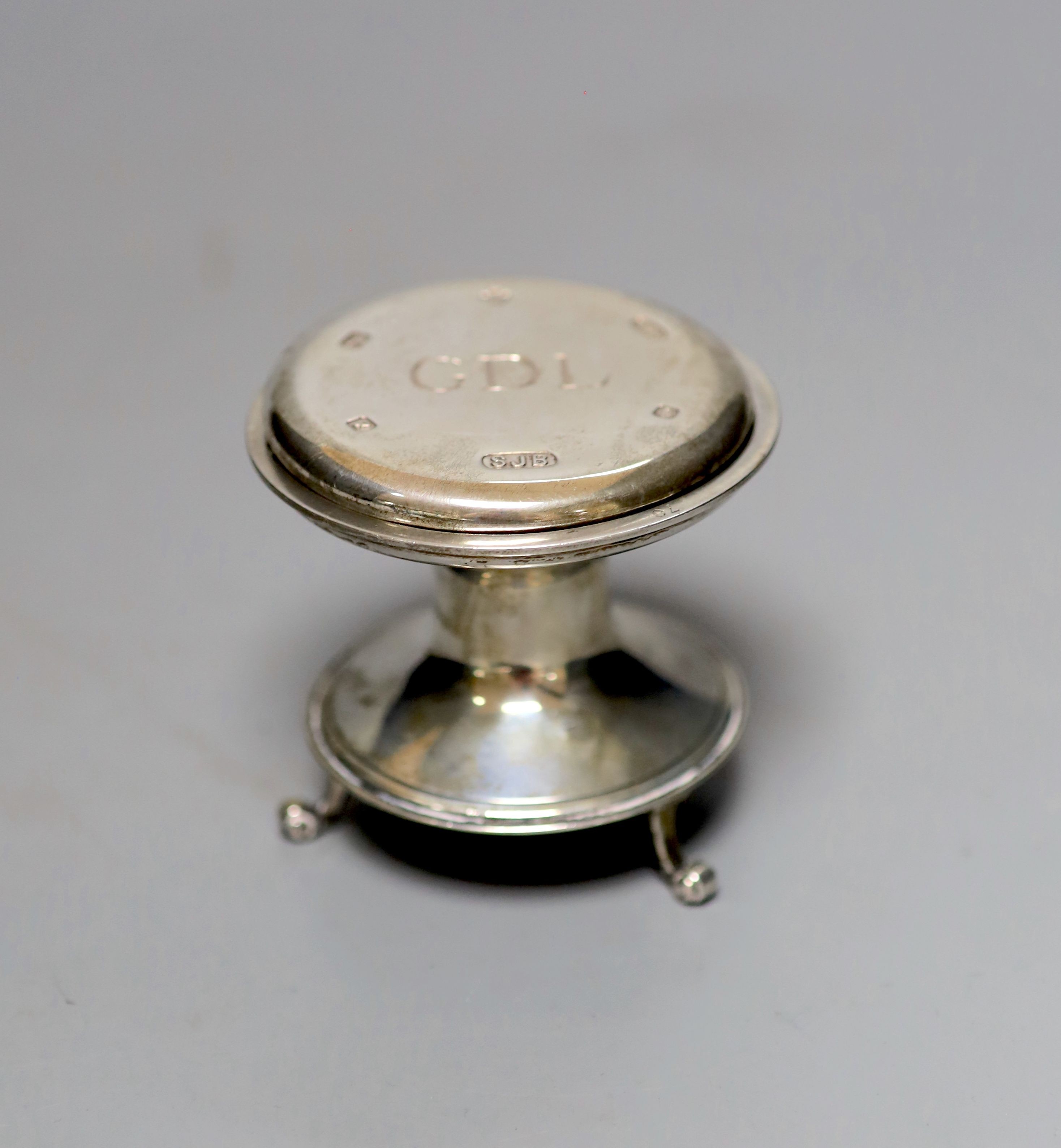 A George V miniature model of a font?, with presentation inscription the the Company of Innholders, London, 1911, 67mm and a modern silver glass coaster.